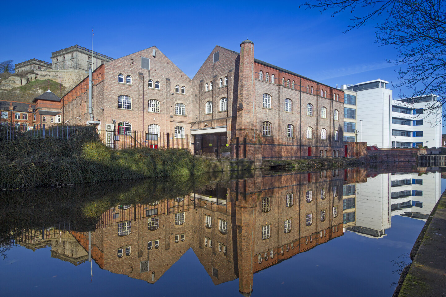 Student Accommodation in Beeston, Nottingham - A calm day by Castle Wharf canalside with Nottingham Castle in the background