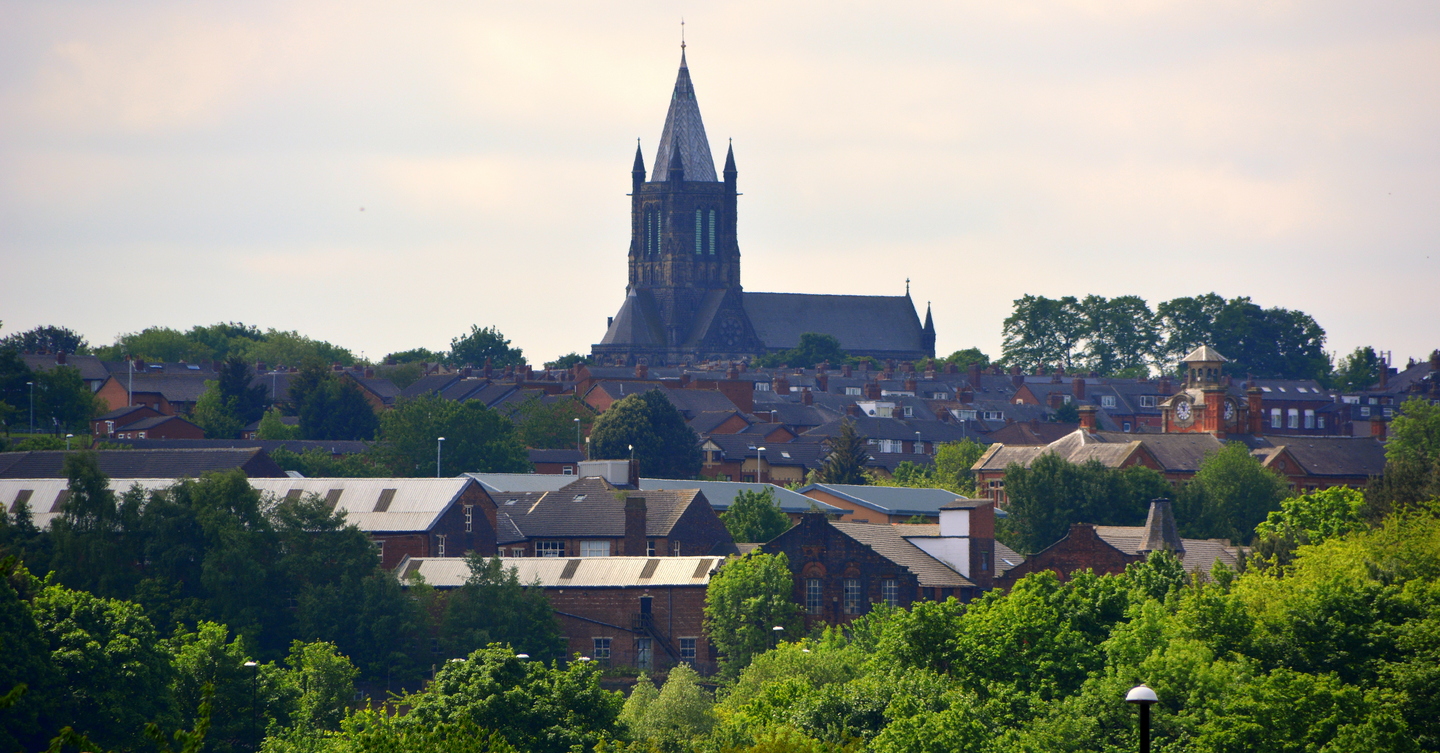 Student Accommodation in Burley, Leeds - Rooftops of Burley, Leeds with St Bartholomew Church in Armley in the background