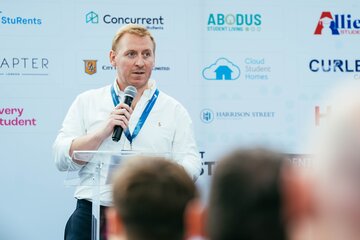 Michael Rainsford speaking at sturents occupancy summit 2024